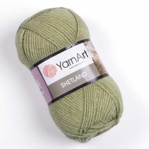 Pelote Shetland vert mise en valeur au premier plan