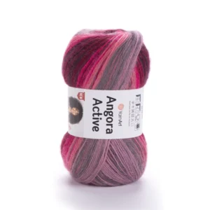Gros plan pelote Angora Active rose bordeaux en lumière naturelle