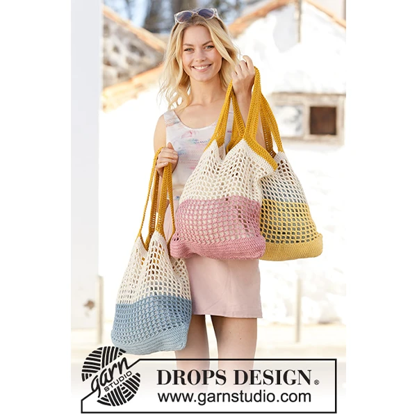 femme avec sac fait au crochet avec le fil paris drops