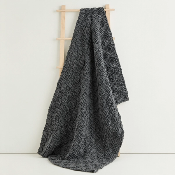 plaid réalisé avec la dmc knitty 10 au tricot