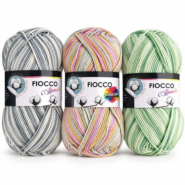 trois pelotes fiocco multicolor sur fond blanc