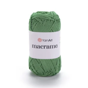 Pelote macrame vert au centre de la photo