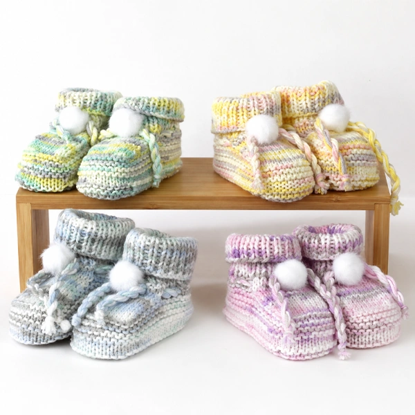 4 paires de chausson pour bébé réalisé avec le fil dmc baby chéri print